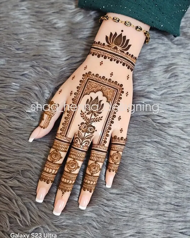 Bridal Royal Back Hand Mehndi Design with Lotus for Diwali