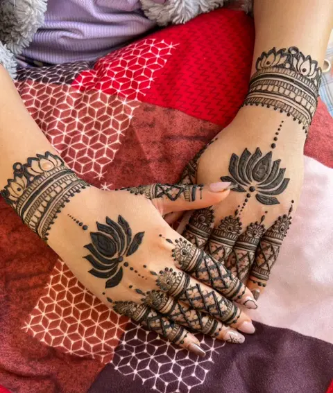 bridal lotus back hand mehndi design