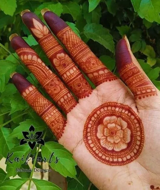 Simple Front Hand Mehndi Design with Gol Tikki and Lotus for Teej
