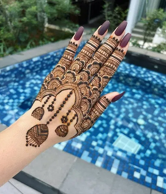 Simple Back Hand Mehndi Design with Gol Tikki for Raksha Bandhan