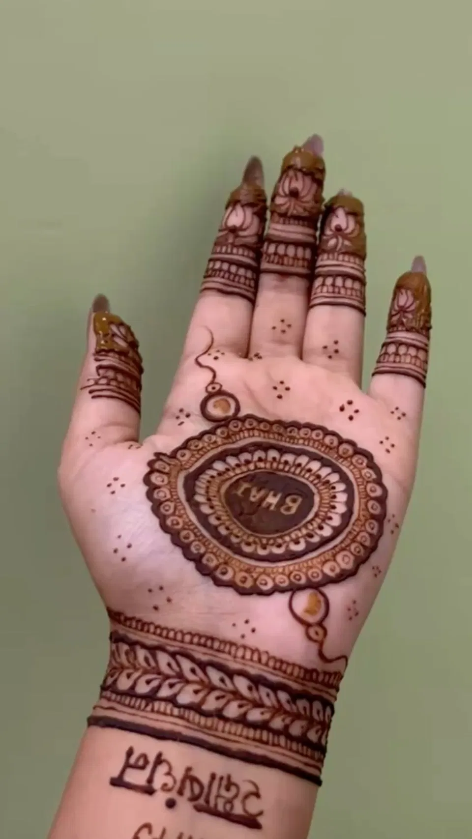 Simple Stylish Back Hand Mehndi Design with Gol Tikki for Raksha Bandhan