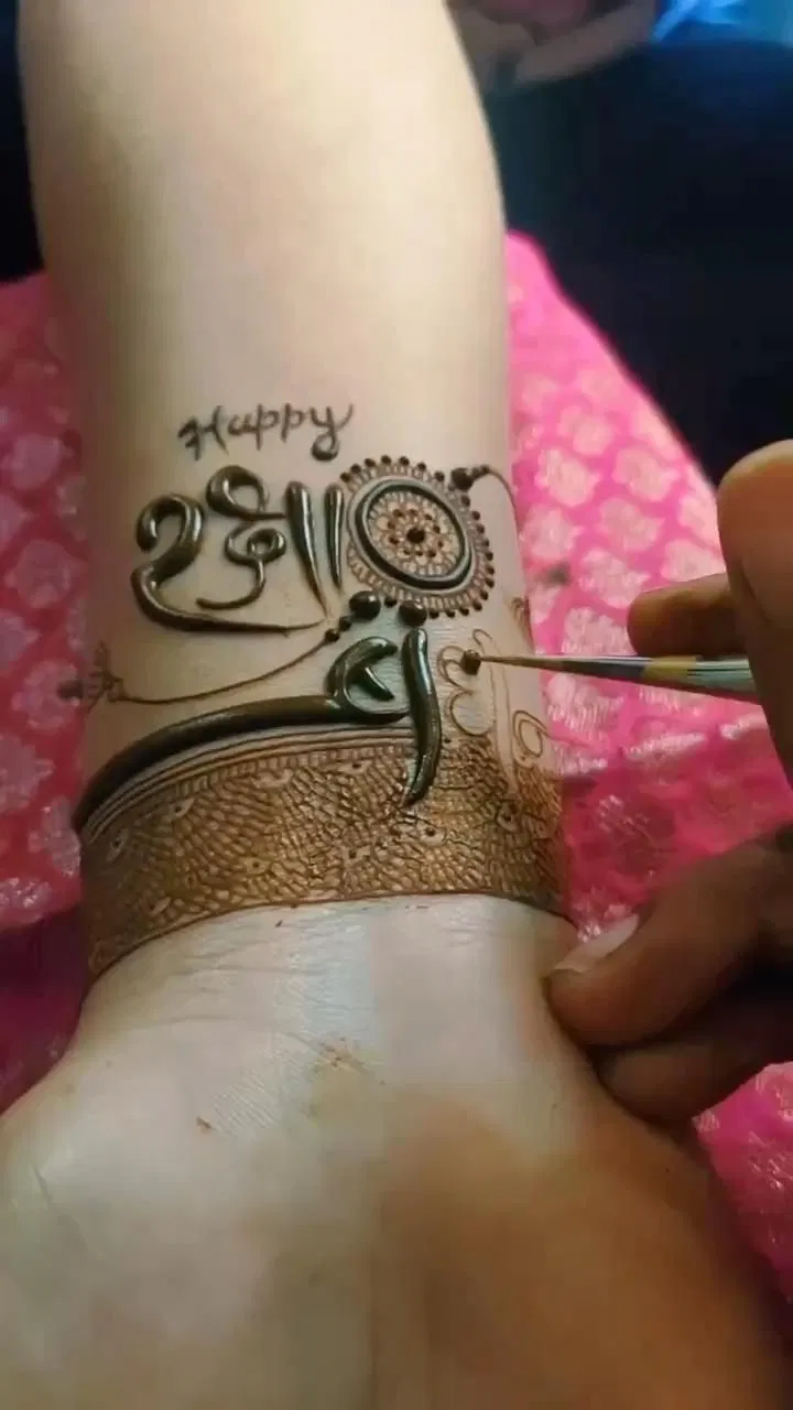 Simple Stylish Arm Mehndi Design with Figures