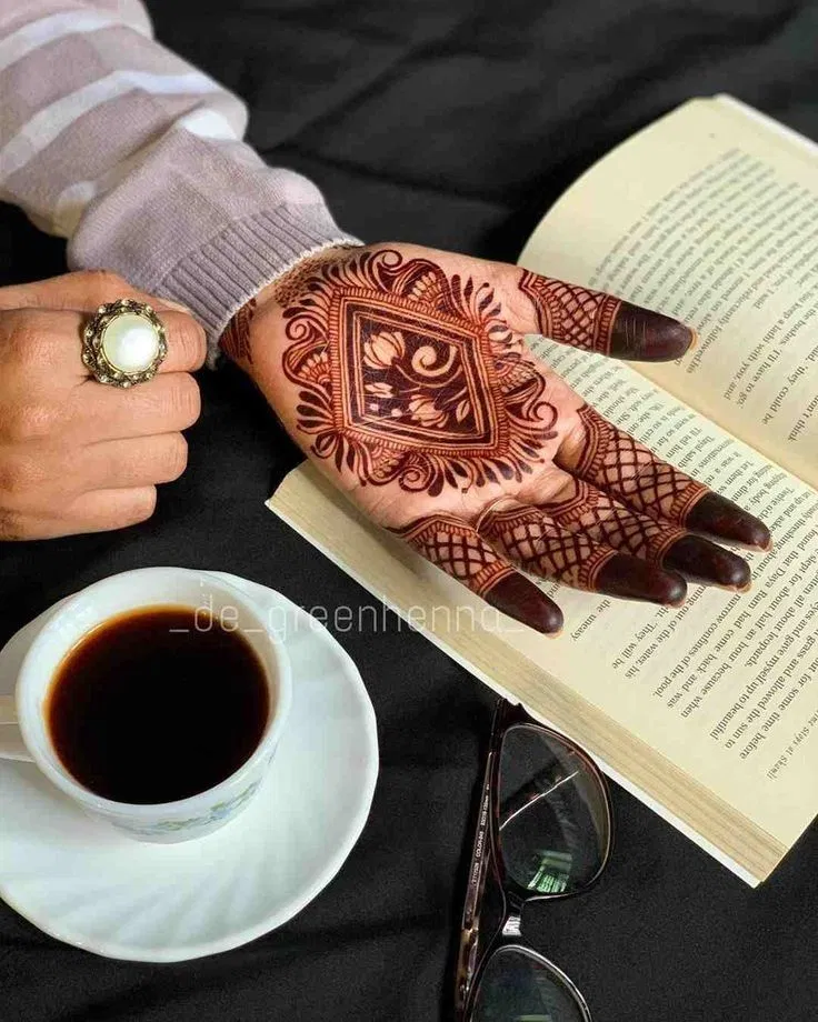 Minimal Back Hand Mehndi Design with Gol Tikki