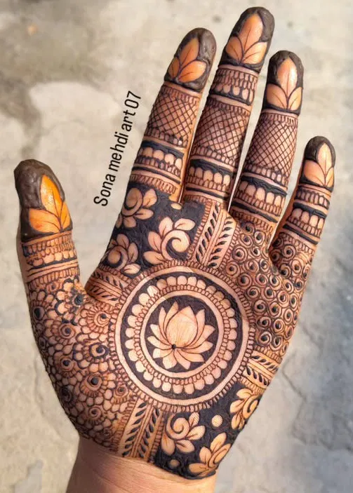 Aesthetic Stylish Front Hand Mehndi Design with Gol Tikki, Flowers and Lotus for Sawan