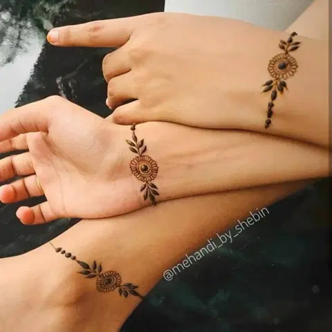 arabic minimal circle back hand mehndi design