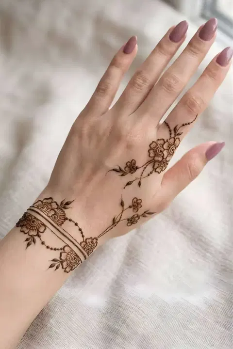 aesthetic arabic flower back hand mehndi design