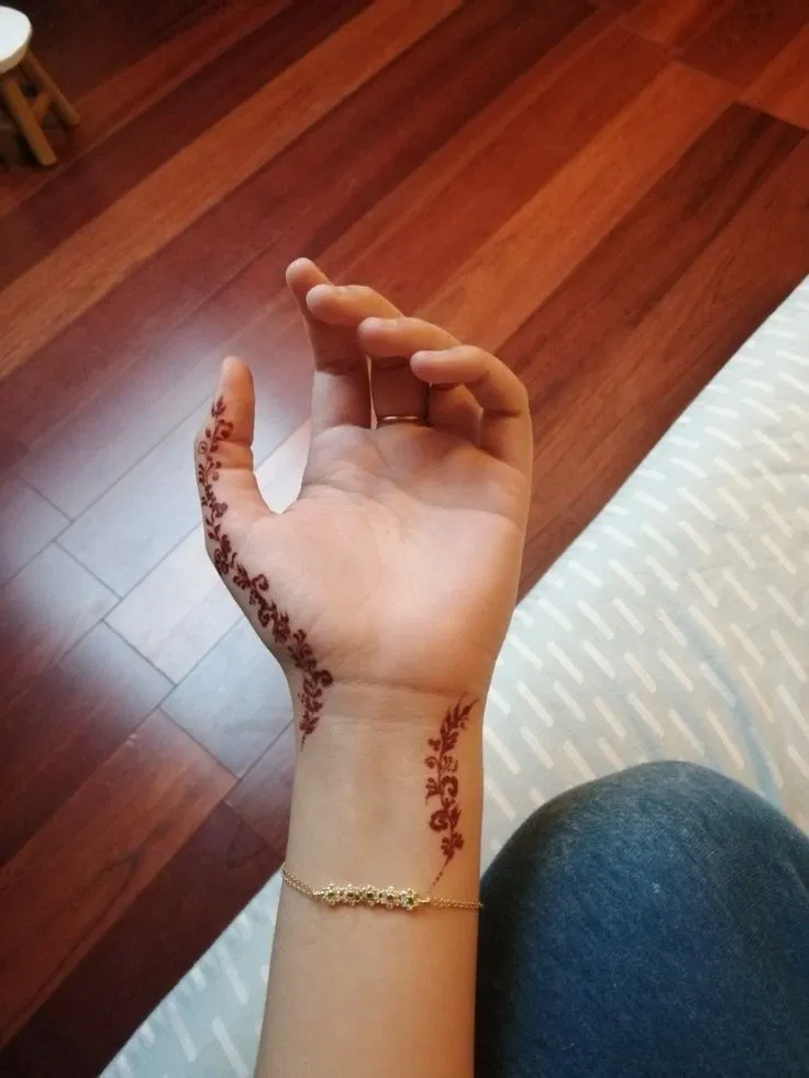 Aesthetic Arabic Arm Mehndi Design with Jaal