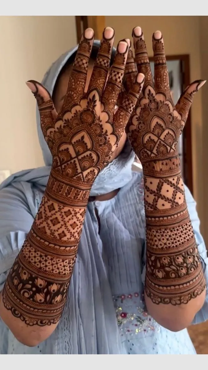Aesthetic Bridal Arm Mehndi Design with Gol Tikki and Figures