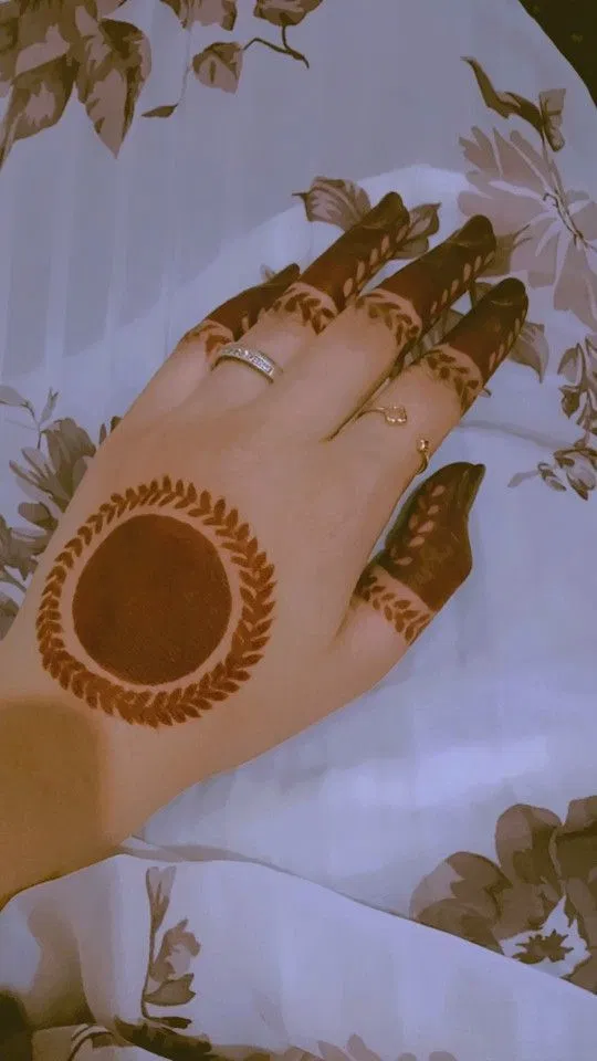 Aesthetic Simple Arm Mehndi Design with Gol Tikki and Jaal