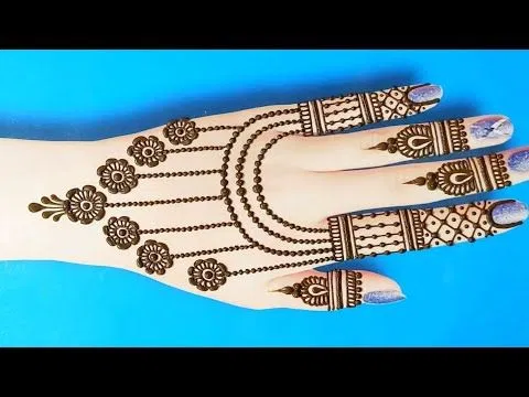 Simple Back Hand Mehndi Design with Bel and Gol Tikki