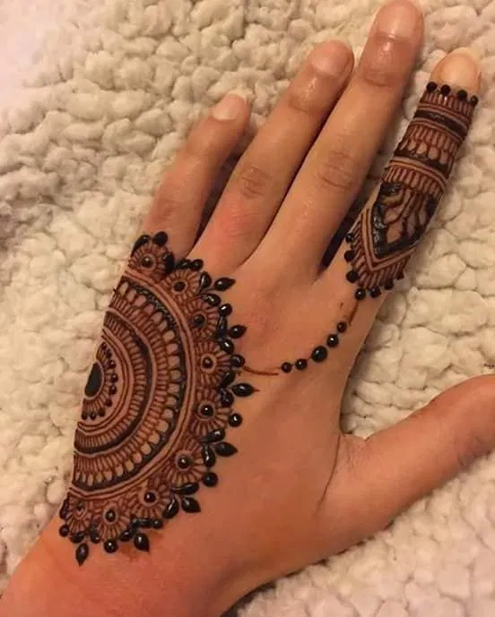 Aesthetic Simple Back Hand Mehndi Design with Bel, Gol Tikki and Jaal