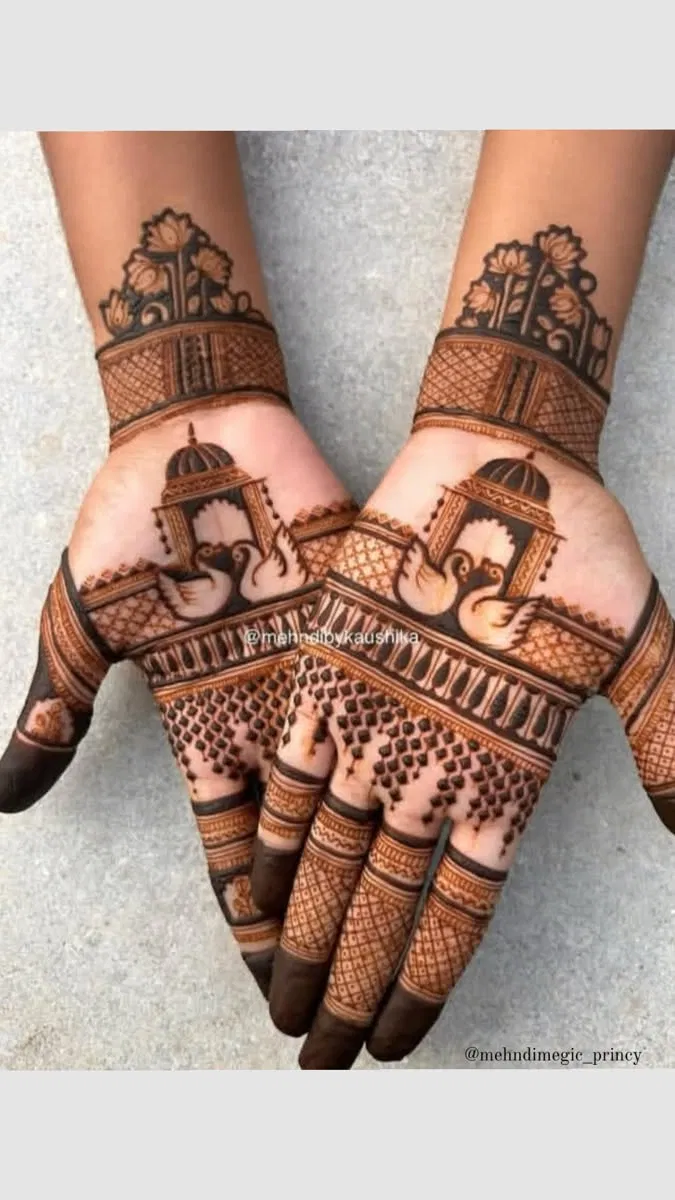 Aesthetic Royal Back Hand Mehndi Design with Figures and Peacock