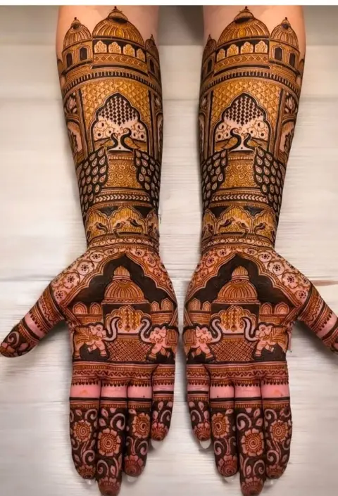 bridal royal figure front hand mehndi design