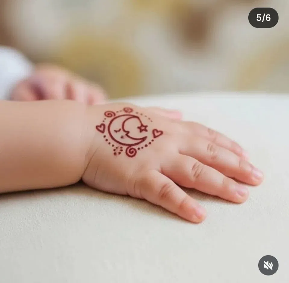 Minimal Simple Back Hand Mehndi Design with Gol Tikki, Hearts and Jaal for Eid
