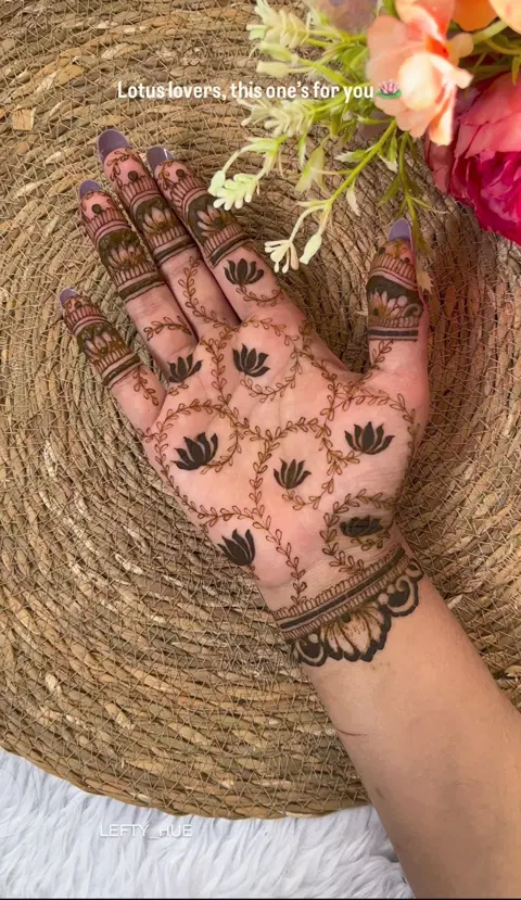 aesthetic minimal circle finger mehndi design
