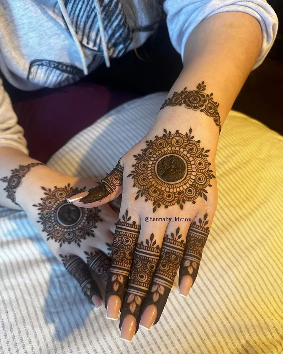 Aesthetic Indian Back Hand Mehndi Design with Gol Tikki, Flowers and Lotus for Diwali (2)