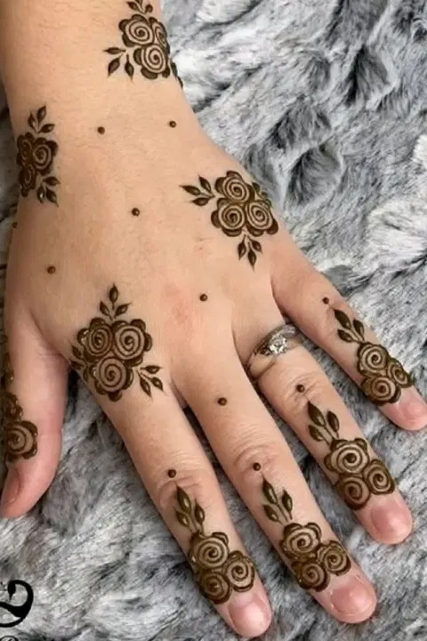 aesthetic arabic flower back hand mehndi design