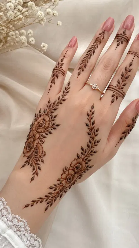aesthetic arabic bel back hand mehndi design