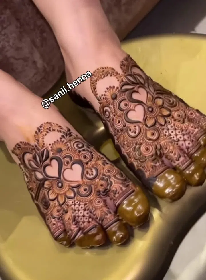 Bridal Dubai Arm Mehndi Design with Figures and Hearts