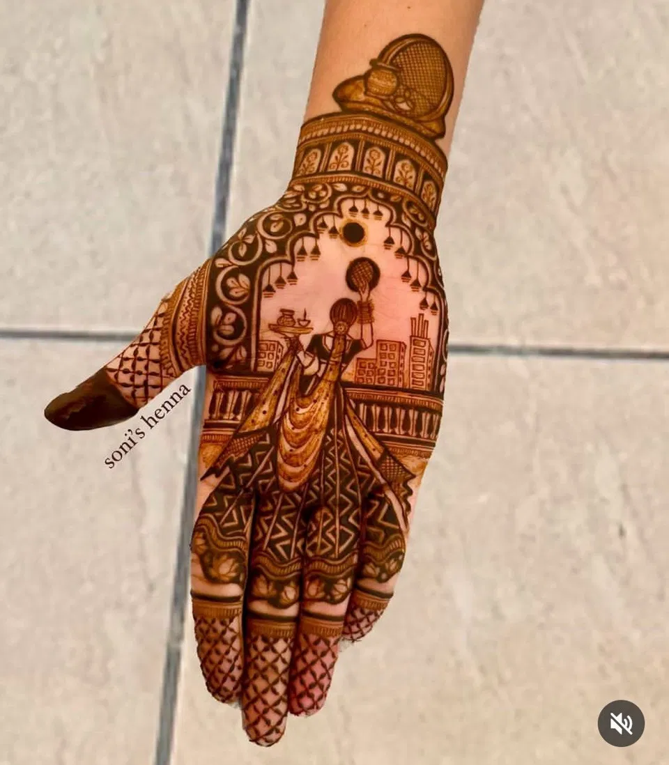 Bridal Stylish Back Hand Mehndi Design with Deity, Figures and Peacock for Karwa Chauth