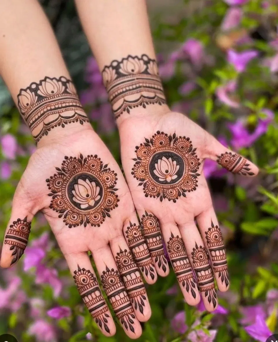 Bridal Indian Mehndi Design with Gol Tikki and Flowers for Karwa Chauth