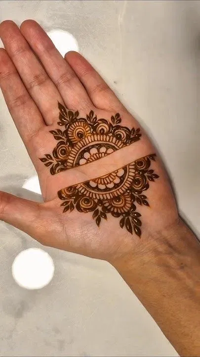 Simple Finger Mehndi Design with Gol Tikki, Deity and Hidden Name