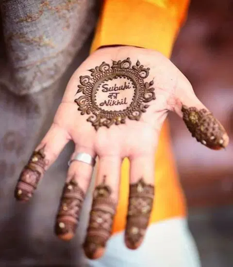 aesthetic bridal circle back hand mehndi design