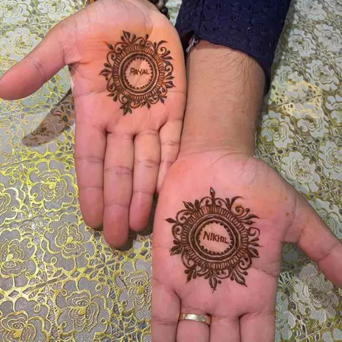 royal simple circle back hand mehndi design