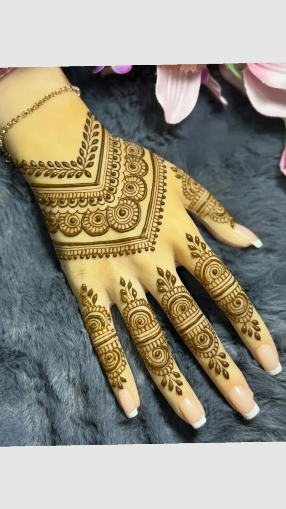 Arabic Bridal Back Hand Mehndi Design with Bel, Gol Tikki and Deity