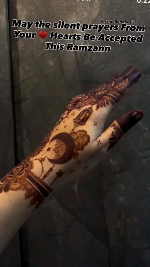 aesthetic arabic deity back hand mehndi design