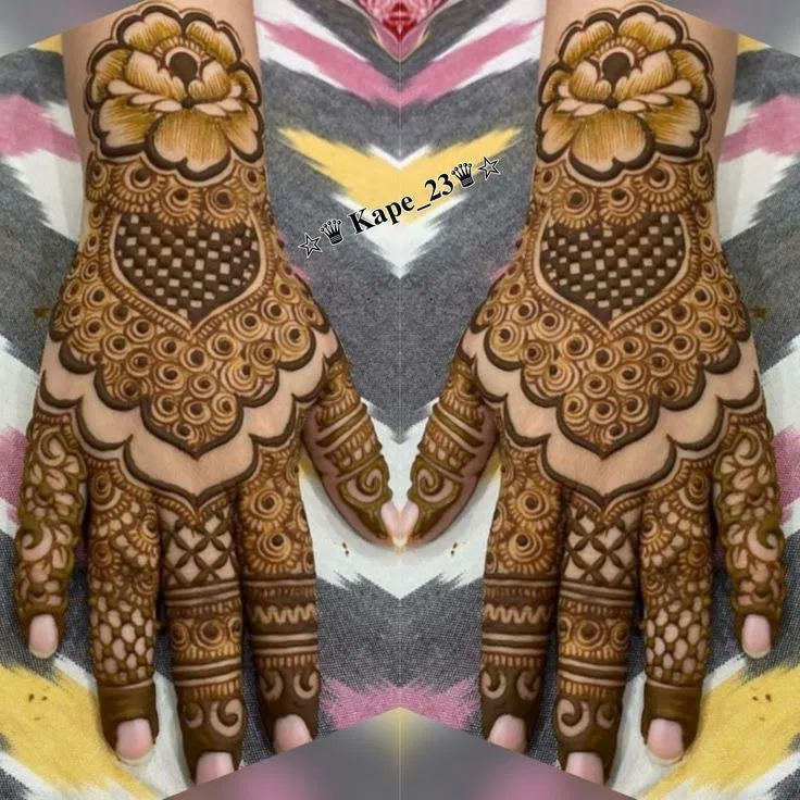 Dubai Back Hand Mehndi Design with Hearts and Lotus