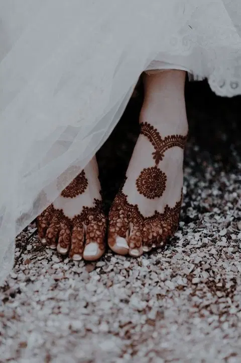 aesthetic bridal deity back hand mehndi design