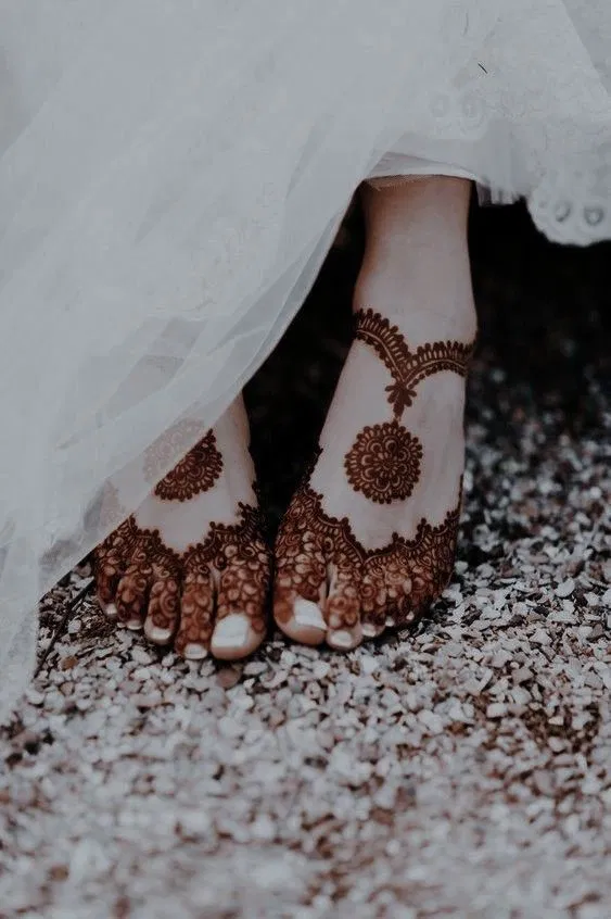 Aesthetic Bridal Back Hand Mehndi Design with Deity and Jaal