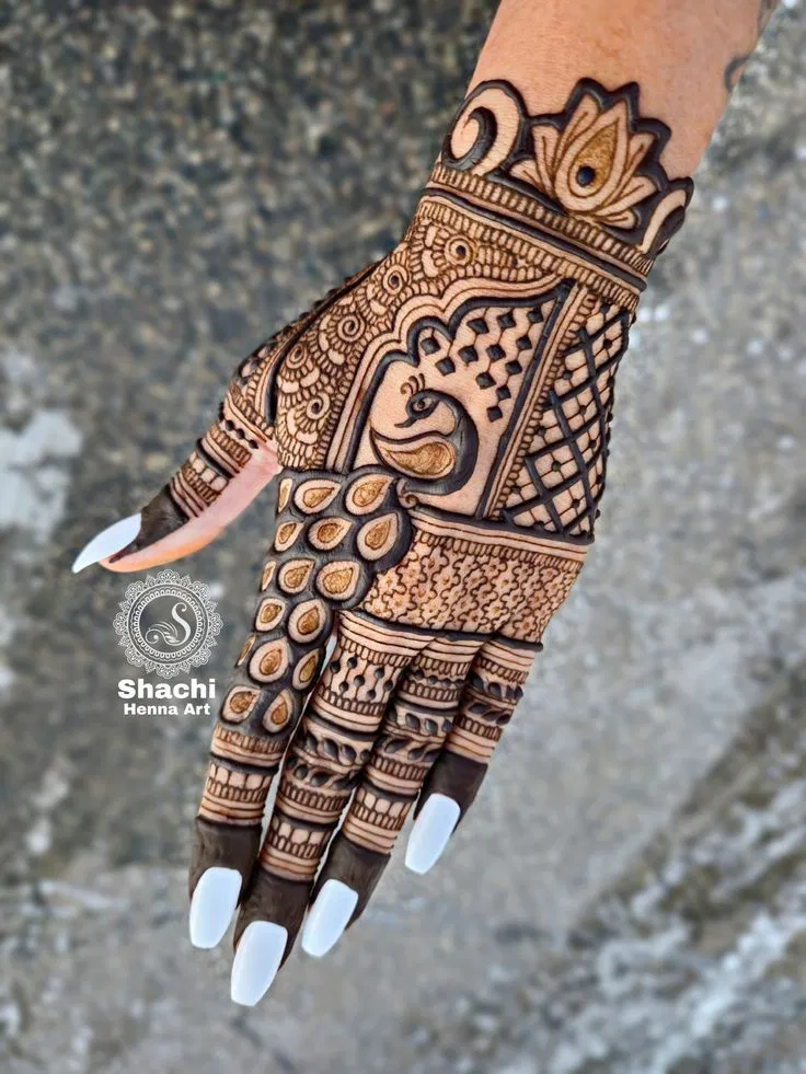 Aesthetic Bridal Back Hand Mehndi Design with Flowers and Peacock