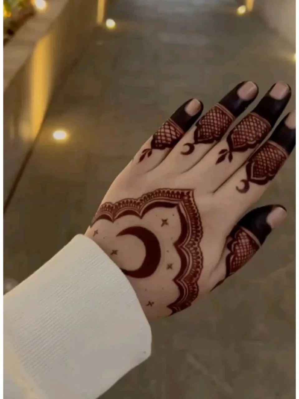 Aesthetic Back Hand Mehndi Design with Hearts and Moon