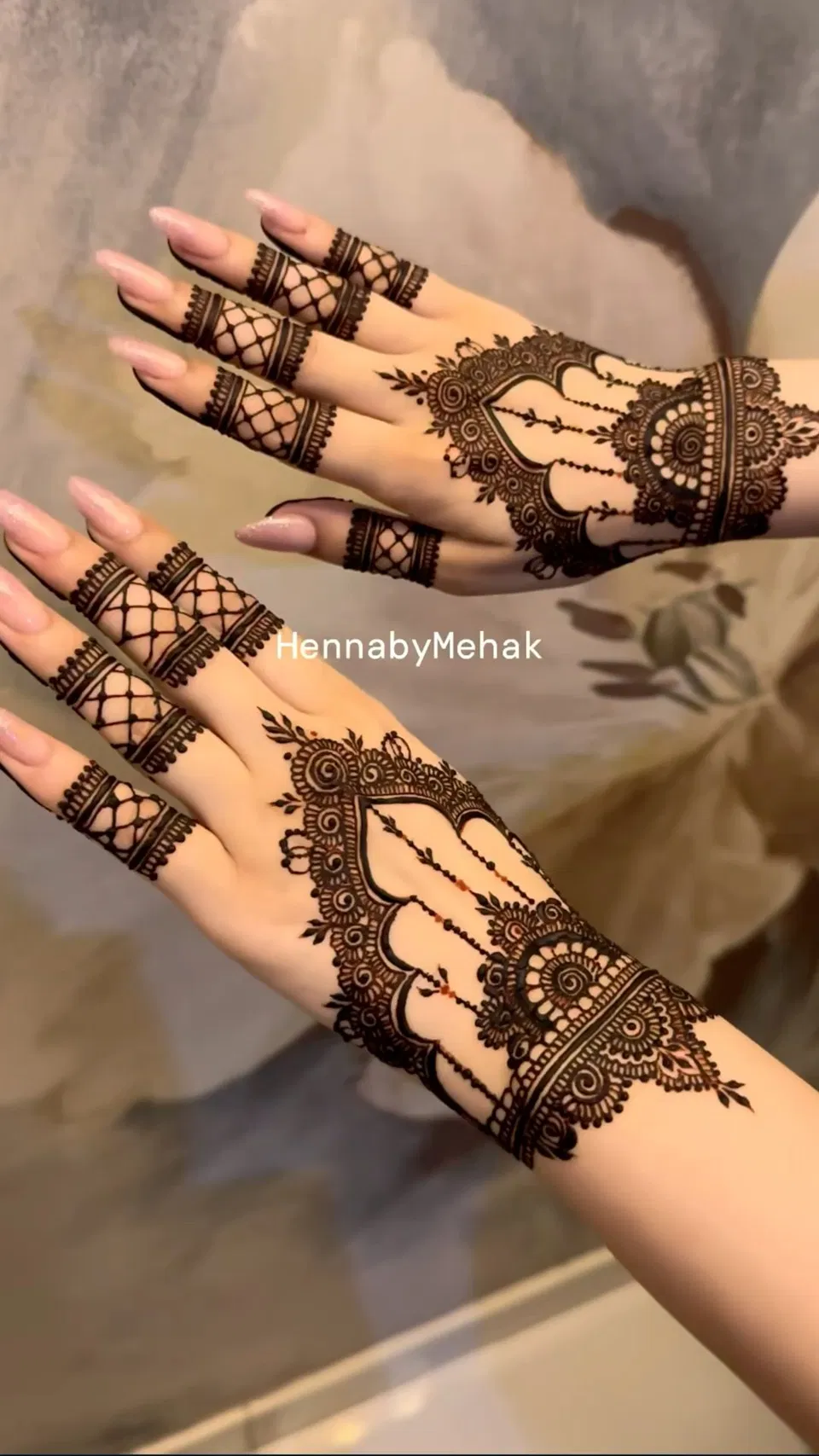 Aesthetic Arabic Back Hand Mehndi Design with Figures, Hearts and Jaal for Eid