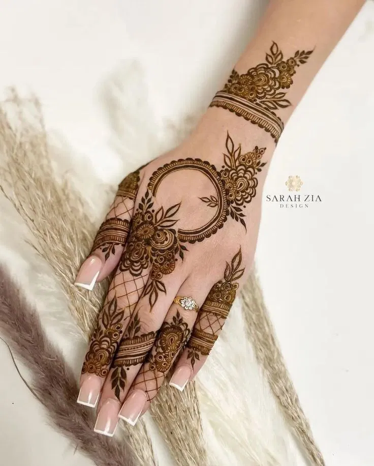 Aesthetic Simple Arm Mehndi Design with Gol Tikki and Flowers for Eid